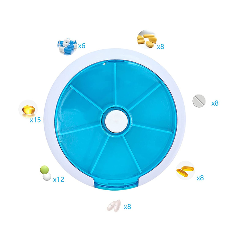 Pilulier hebdomadaire rotatif à bouton-poussoir avec 7 compartiments 