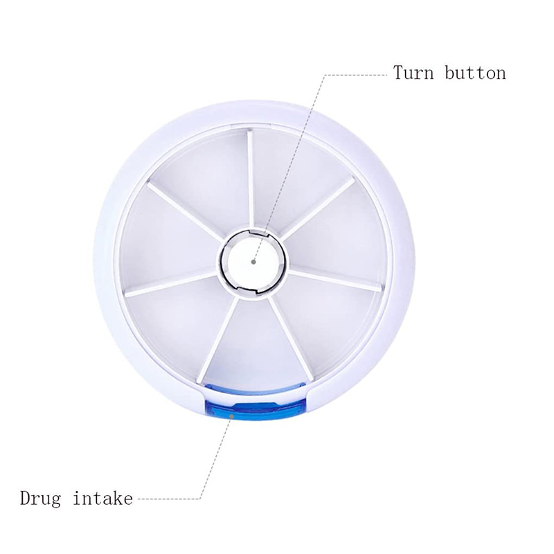 Pilulier hebdomadaire rotatif à bouton-poussoir avec 7 compartiments 