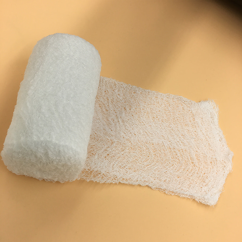 Rouleau de bandage de gaze froissée en coton stérile